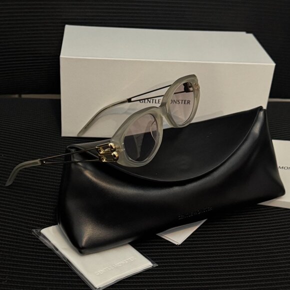 Gentle Monster Translucent Oval Sunglasses Gold Logo Chic Luxe main image 8